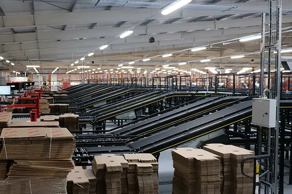 Incline belt conveyor – part of automation system in warehouse Incline belt conveyor - part of automation system in warehouse